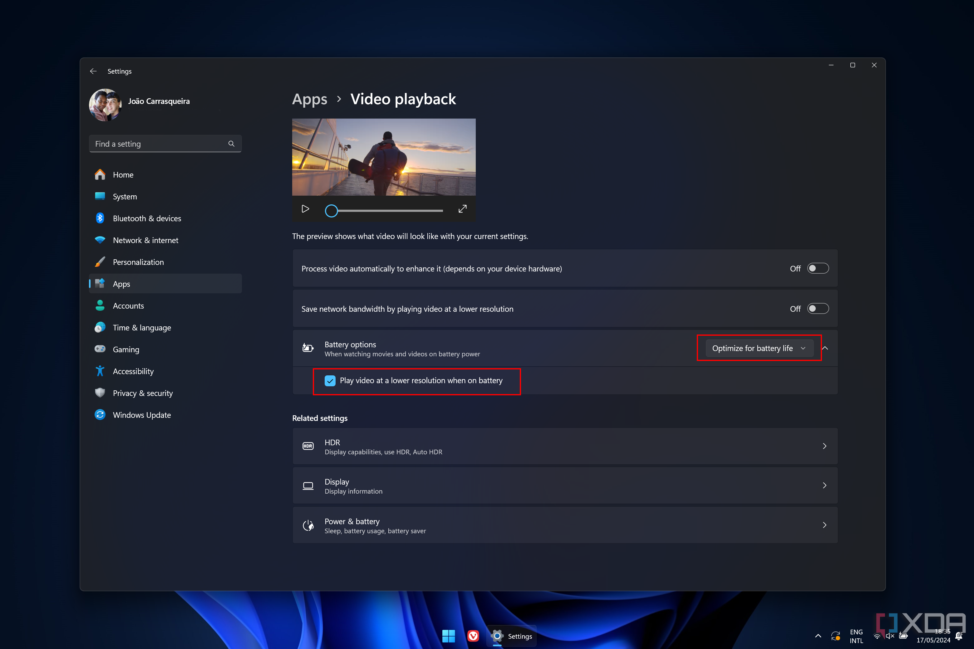 Screenshot of video playback settings on Windows 11 with battery options set to optimize for battery life and play videos at a lower resolution on battery power