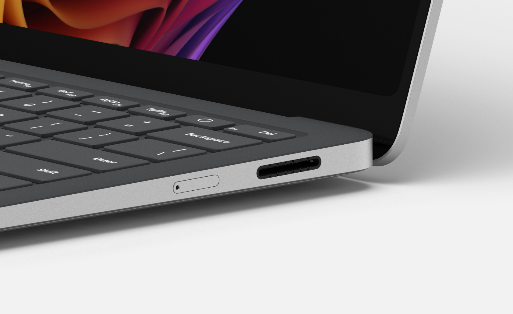 The nano SIM slot on the Surface Laptop 5G sits beside the Surface Connect charging port.