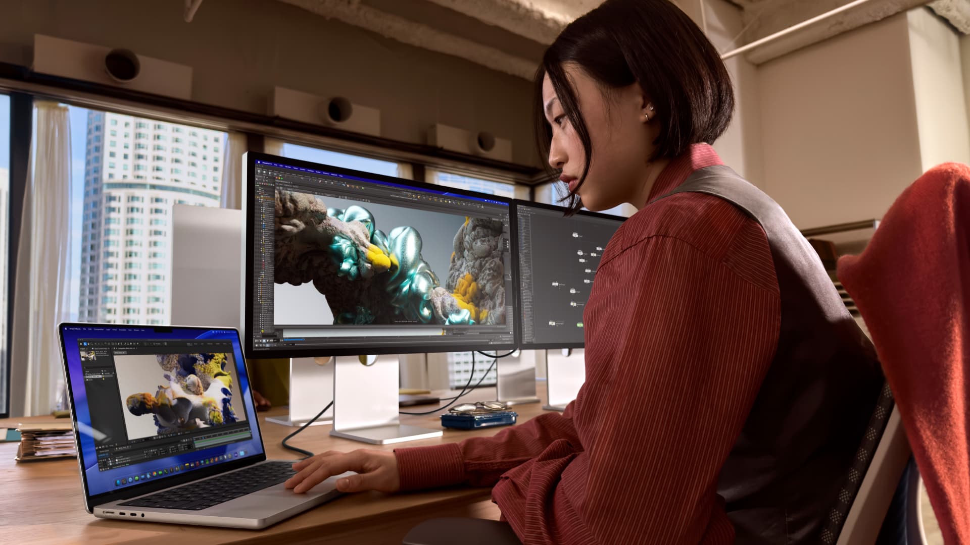 A person using the MacBook Pro with M5 Pro or M5 Max chip.